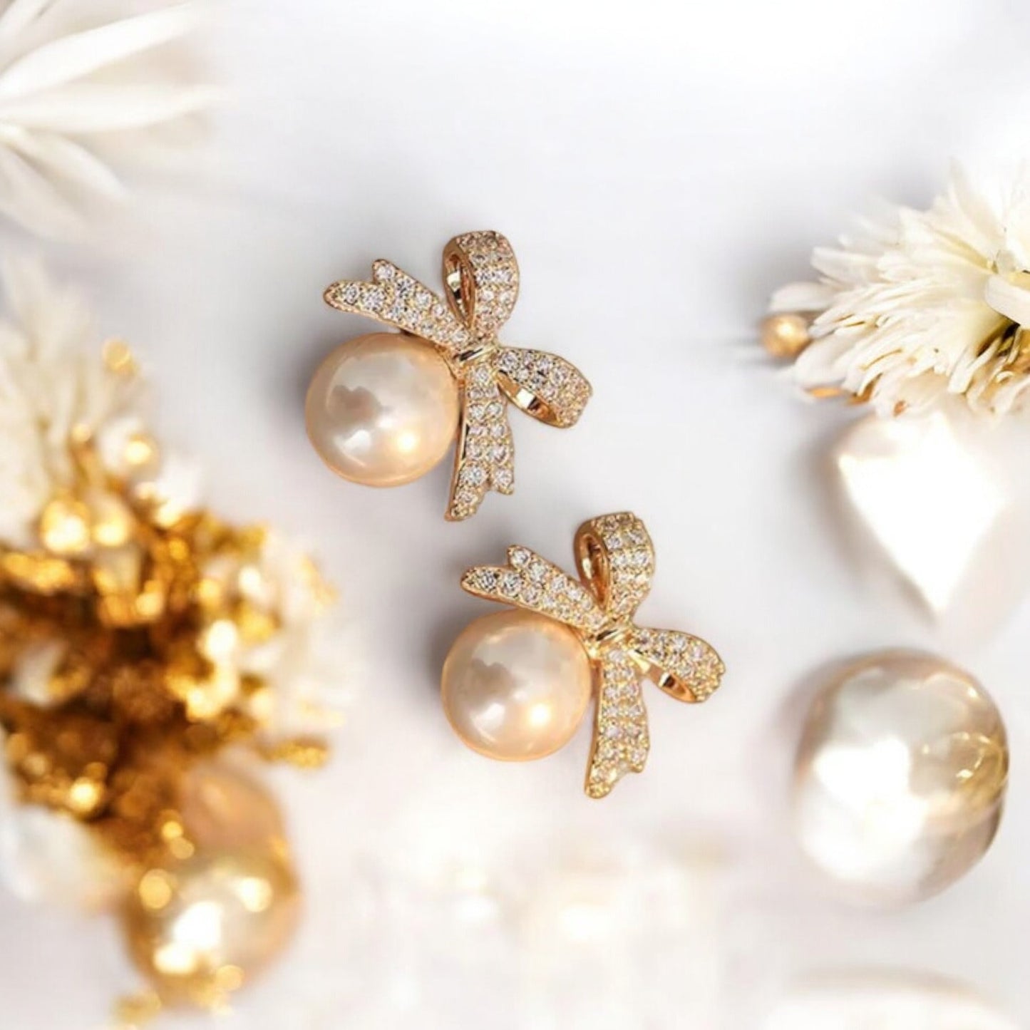 Bow Pearl Golden Stud Earrings