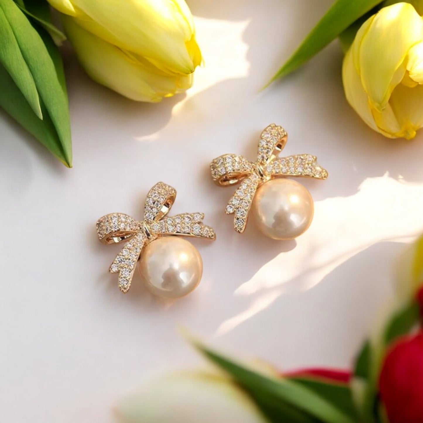 Bow Pearl Golden Stud Earrings