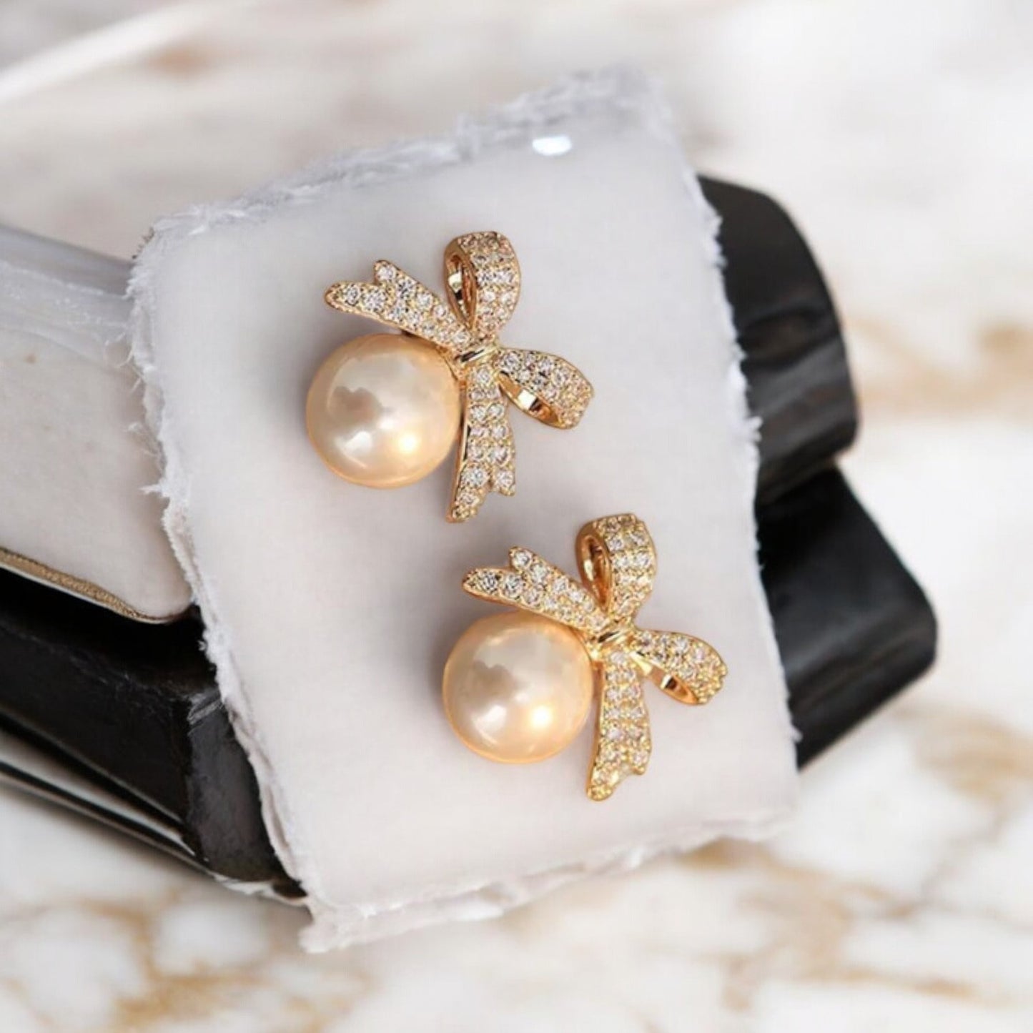 Bow Pearl Golden Stud Earrings