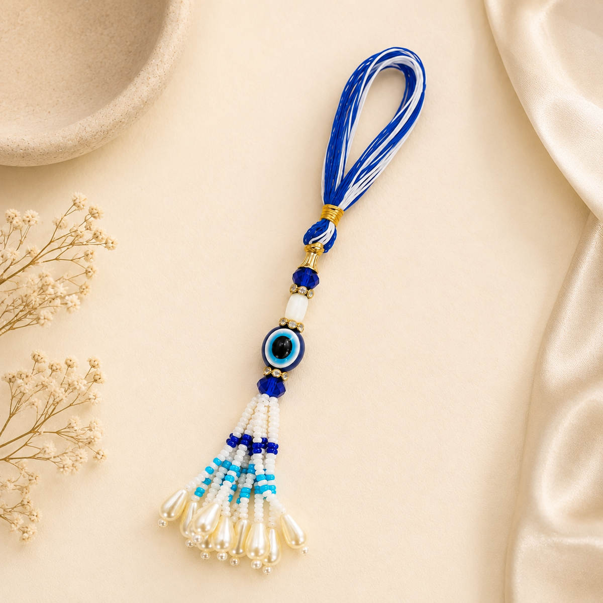 Divine Evil Eye Tassel Rakhi