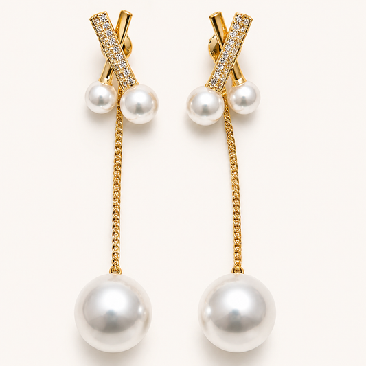 Celeste Gold Pearl Dangle Earrings