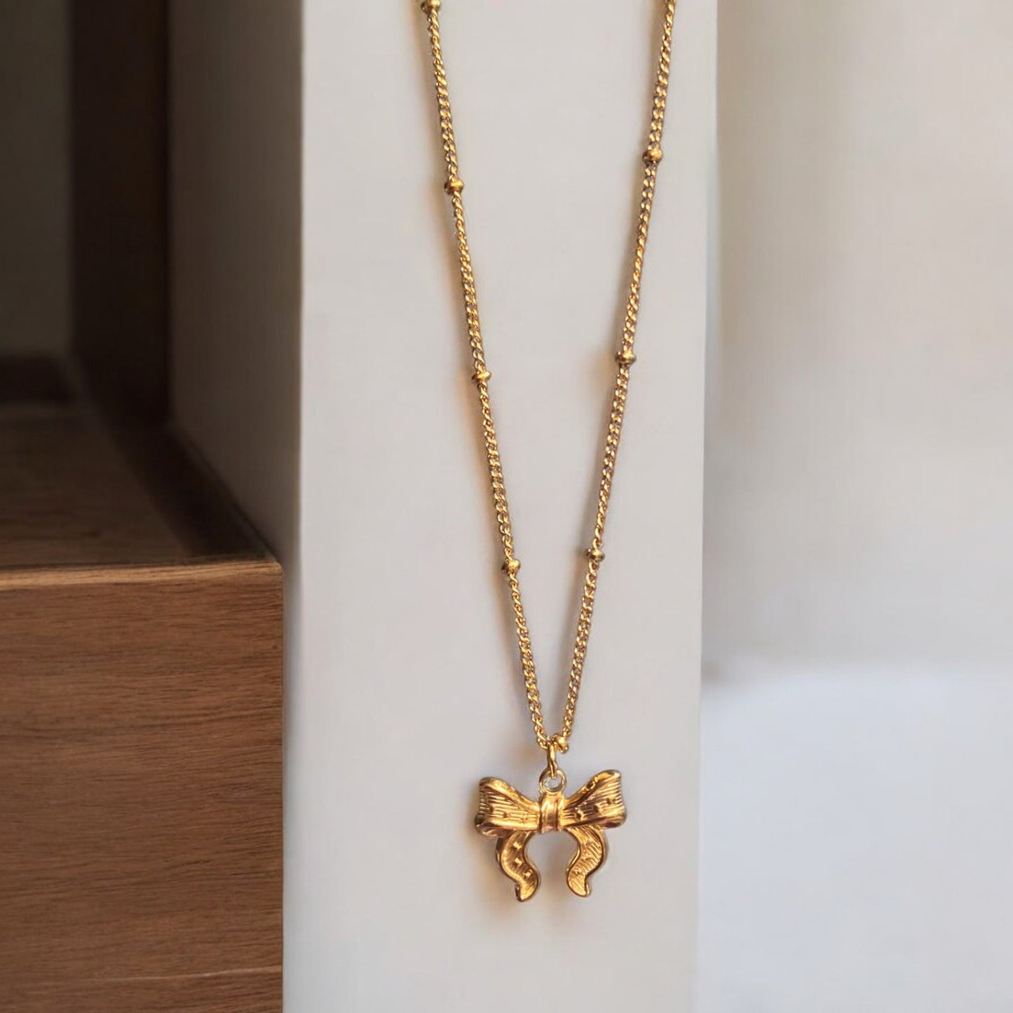 Anti Tarnish Gold Bow pendant necklace