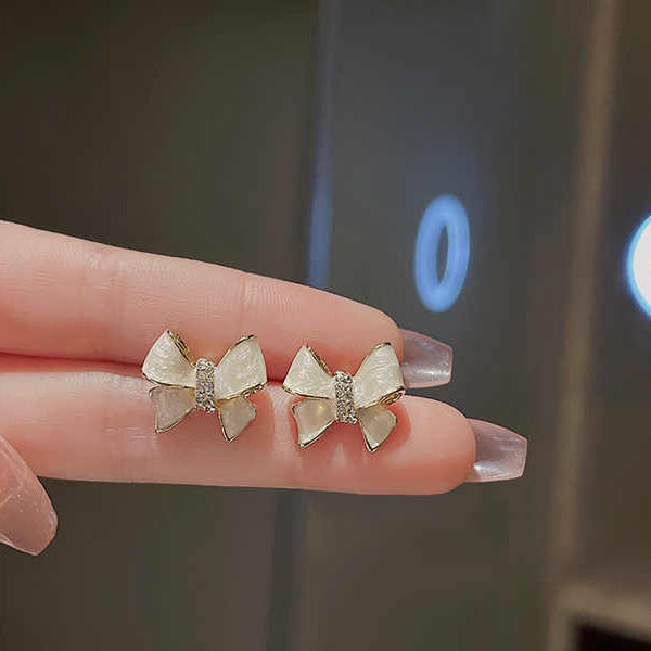 White Bow Stud Earrings