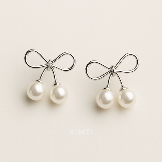 Silver Bow Pearl Drop Earrings