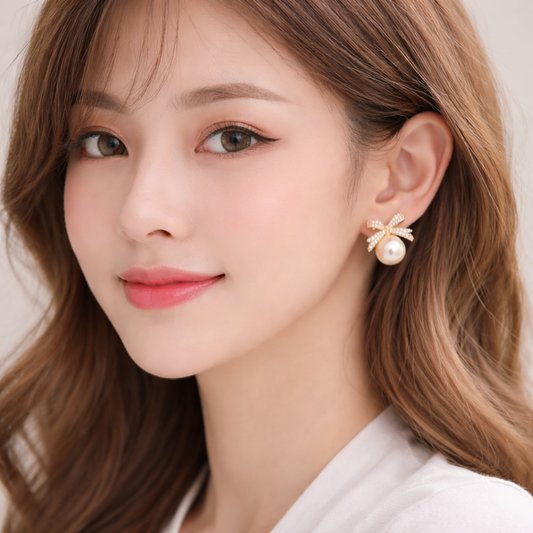 Bow Pearl Golden Stud Earring