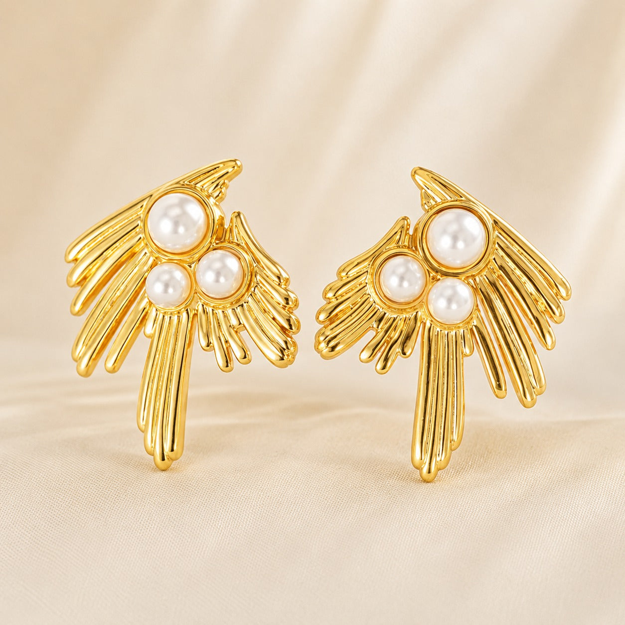 Golden Pearl Wing Stud Earrings